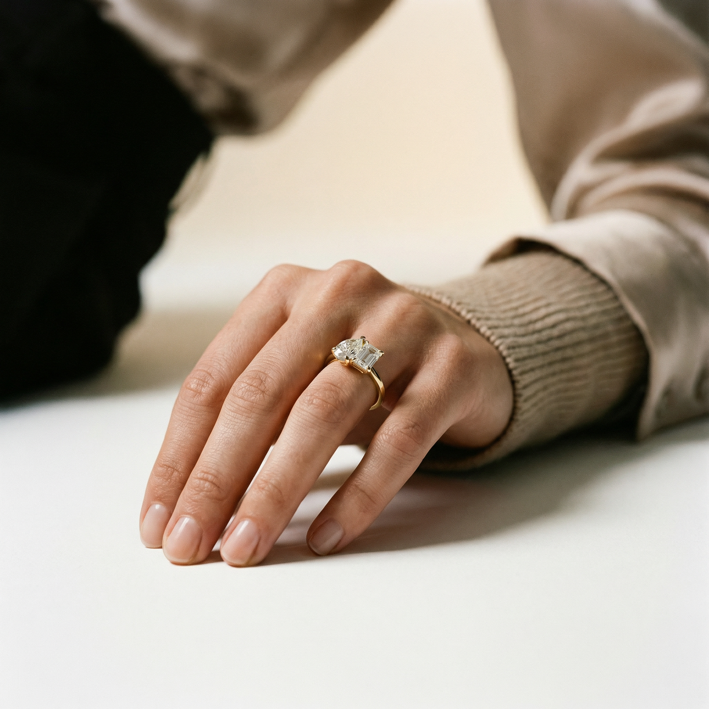 PEAR & EMERALD TWO-STONE