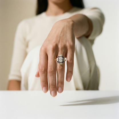 4 CLAW OVAL GRADUATING BAGUETTE HALO